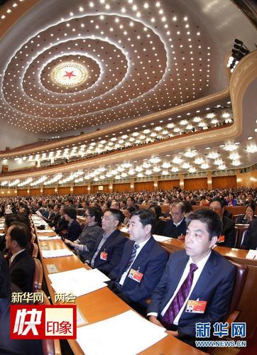 3月13日，全国政协十二届三次会议在北京人民大会堂举行闭幕会。新华社记者 李刚 摄