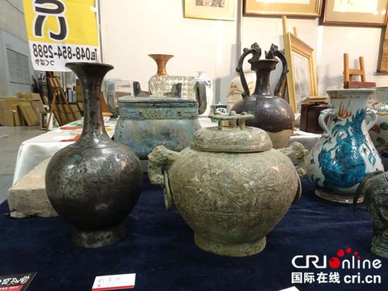 这几件青铜制品都标记为西周时代，售价从几十万日元至上百万日元