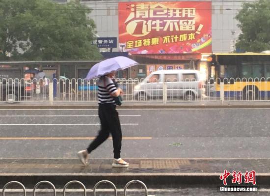 资料图：6月23日清晨，北京降雨持续，并出现了短时大雨。 <a target='_blank' href='http://www.chinanews.com/' >中新网</a>记者 富宇 摄