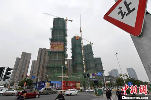 资料图：城市中在建商品房。<a target='_blank' href='http://www.chinanews.com/'>中新社</a>记者 吕明 摄