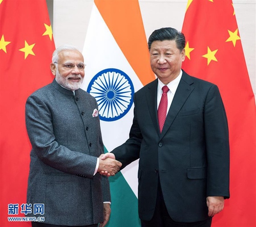 6月9日，国家主席习近平在青岛会见印度总理莫迪。新华社记者 李学仁 摄