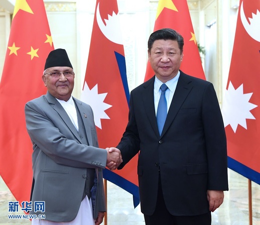 6月20日，国家主席习近平在北京人民大会堂会见尼泊尔总理奥利。　新华社记者饶爱民摄