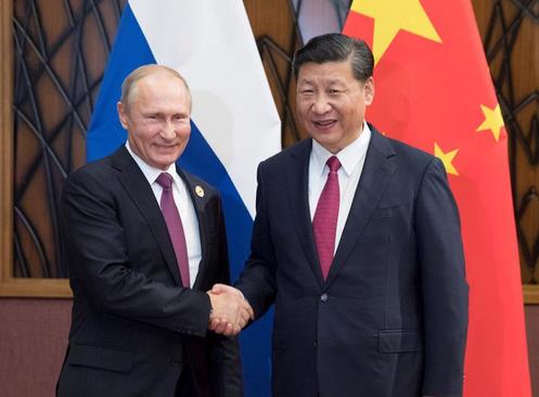 2017年11月10日，习近平在越南岘港会见俄罗斯总统普京。图片来源：新华网