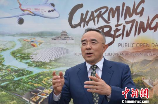 北京市文化和旅游局副巡视员马文在活动开幕式上致辞。　李强 摄