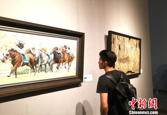 第十三届全国美术作品展览港澳台·海外华人邀请作品展在广州开幕 郭军 摄