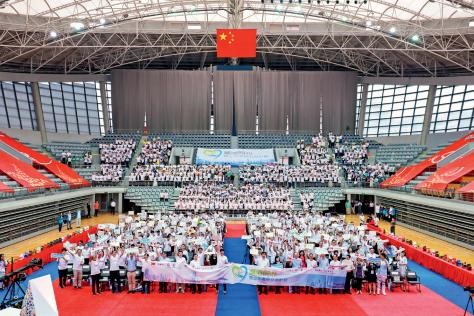 2019 年 7 月 9 日沪港两地千名中学生齐聚复旦大学礼堂共同庆祝祖国七十华诞