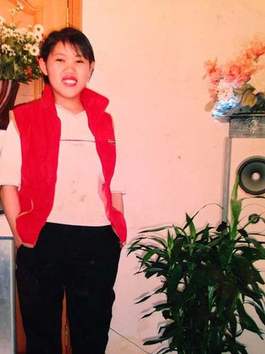 钱仁凤留给父母的照片，拍摄于投毒案前半年。