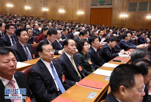 3月15日，第十二届全国人民代表大会第五次会议在北京人民大会堂举行闭幕会。这是代表在听会。 新华社记者谢环驰摄