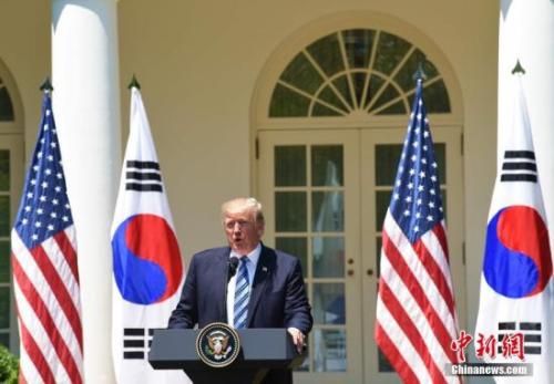 当地时间6月30日，美国总统特朗普在白宫会见韩国总统文在寅，并出席联合记者会。图为特朗普在联合记者会上发表讲话。<a target='_blank' href='http://www.chinanews.com/'>中新社</a>记者 刁海洋 摄