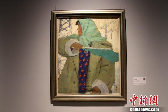 图为赵友萍1959年创作的油画《工地指挥员》。　曾洁 摄