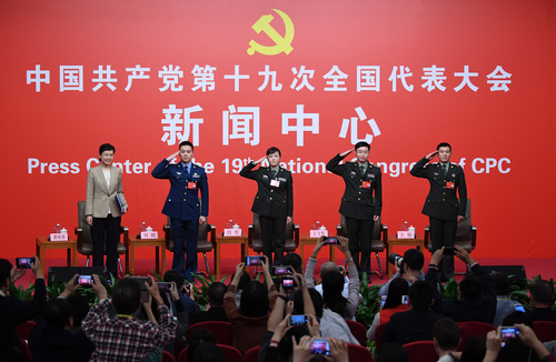 （1）十九大新闻中心举行“中国特色强军之路迈出坚定步伐”集体采访