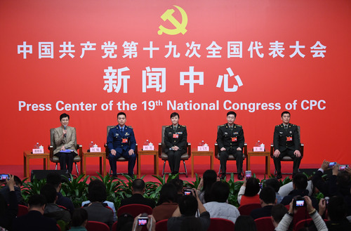 （2）十九大新闻中心举行“中国特色强军之路迈出坚定步伐”集体采访