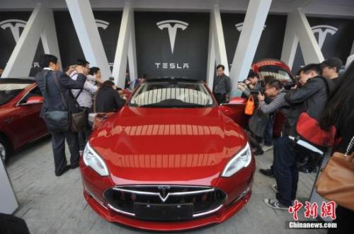 7月，美国车企特斯拉宣布在上海投资设厂。(资料图)<a target='_blank' href='http://www.chinanews.com/'>中新社</a>发 张亨伟 摄