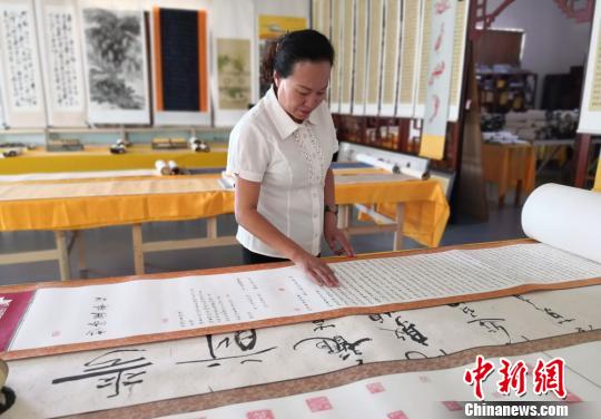 敦煌现代“藏经人”：藏经书作品逾万件冀融合教育共享世界